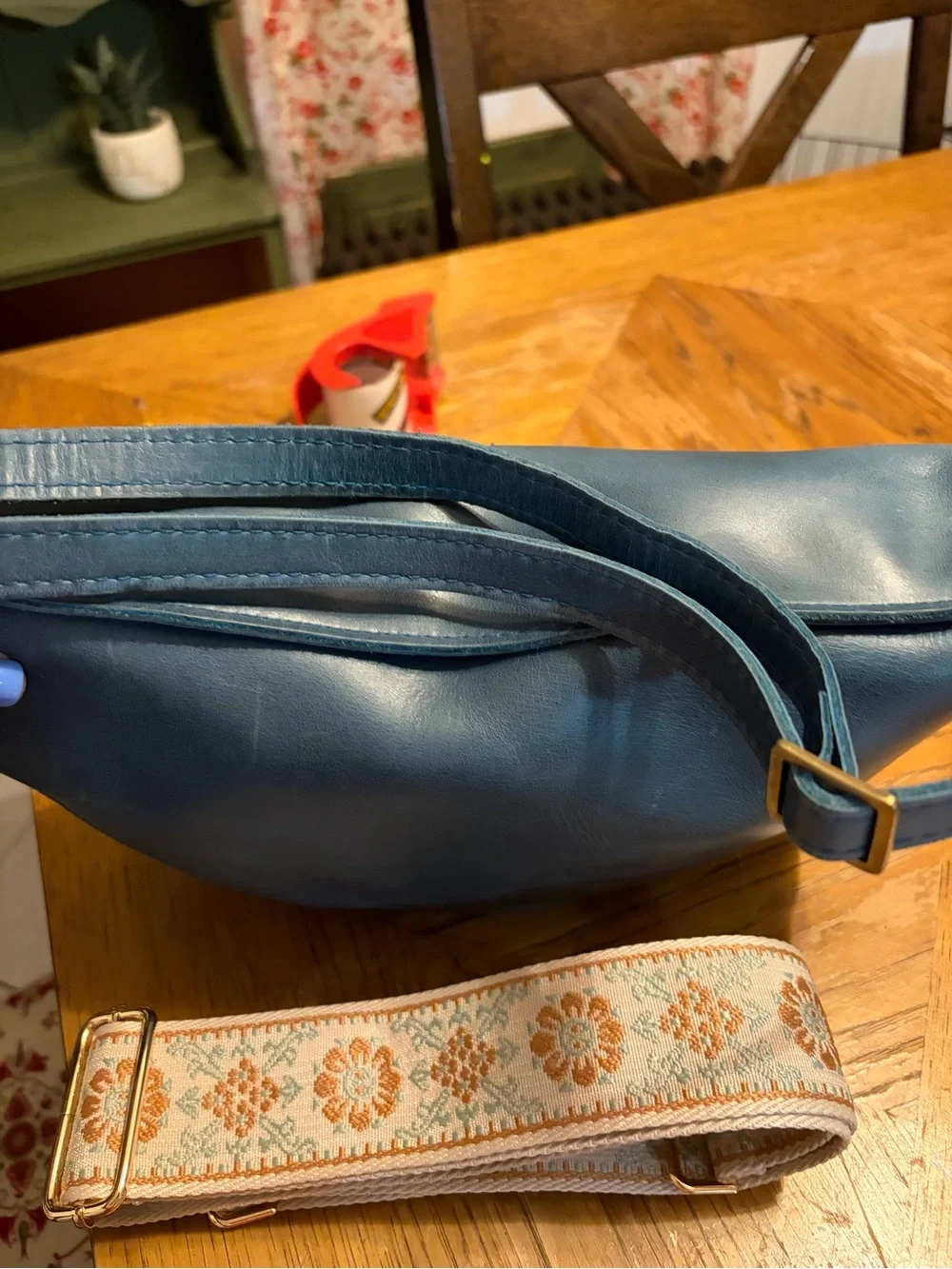 Blue Leather Crescent Shoulder Bag with Patterned Strap